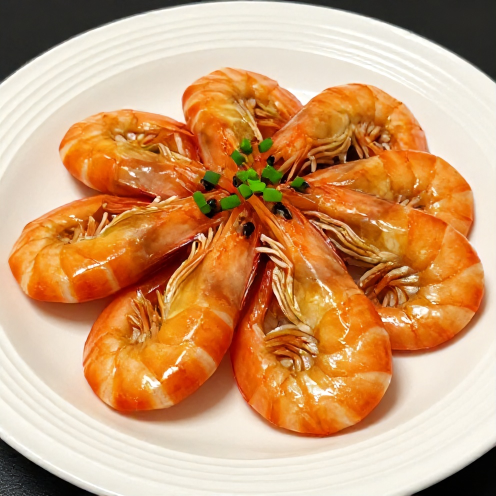 Honey garlic shrimp served on a plate with green onions