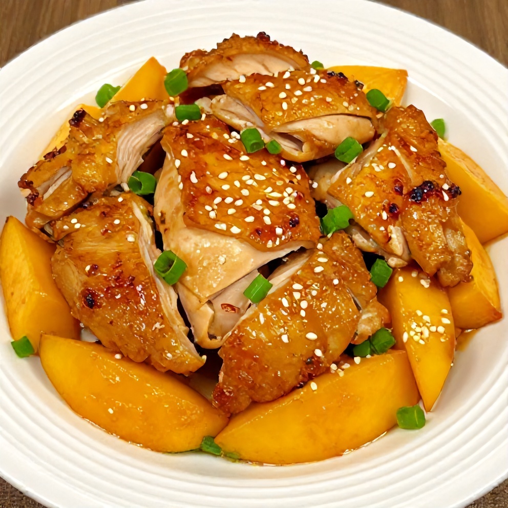 Plated Mango Glazed Chicken with garnish